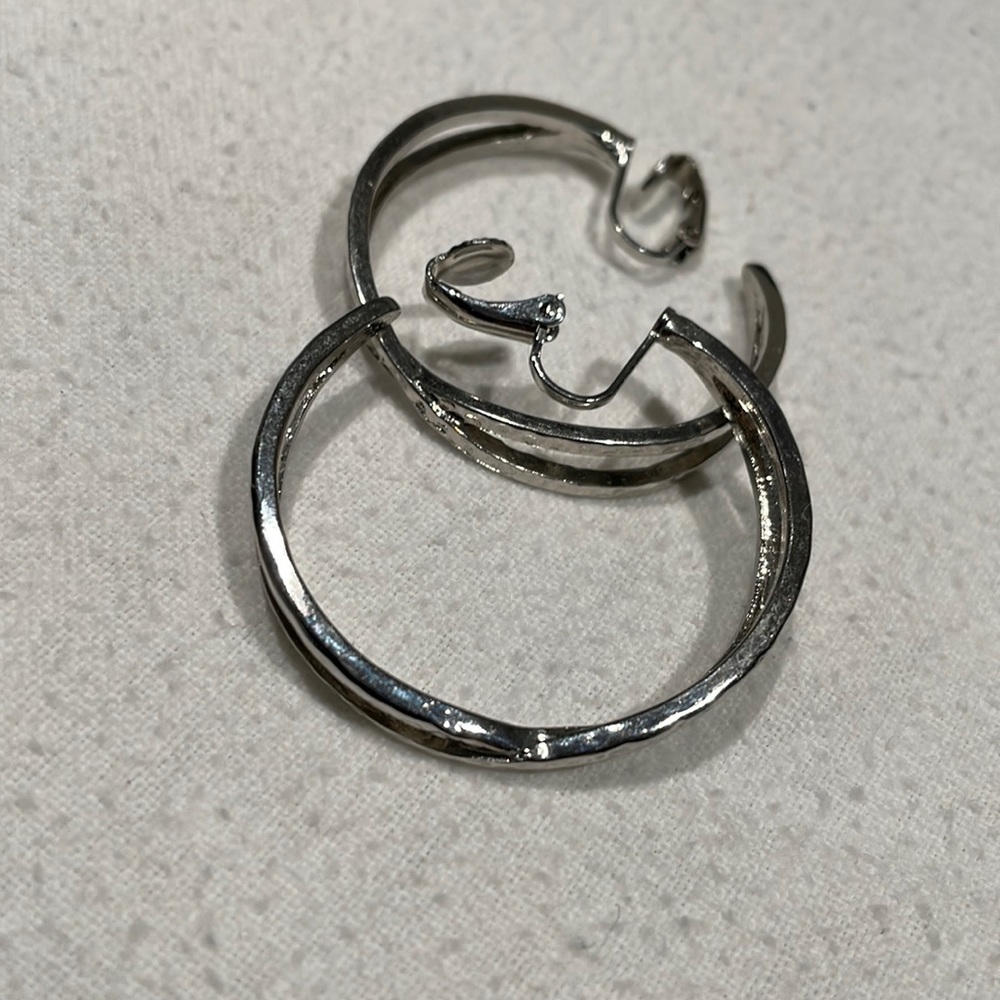 Silver tone clip on earrings
